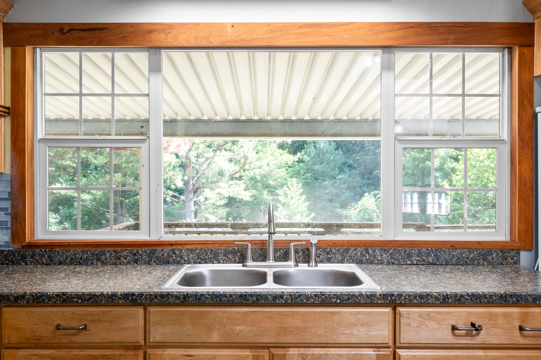 107 Holland Road Dickson, TN 37055 - Photo 12 of 31 a kitchen with granite countertop a large window