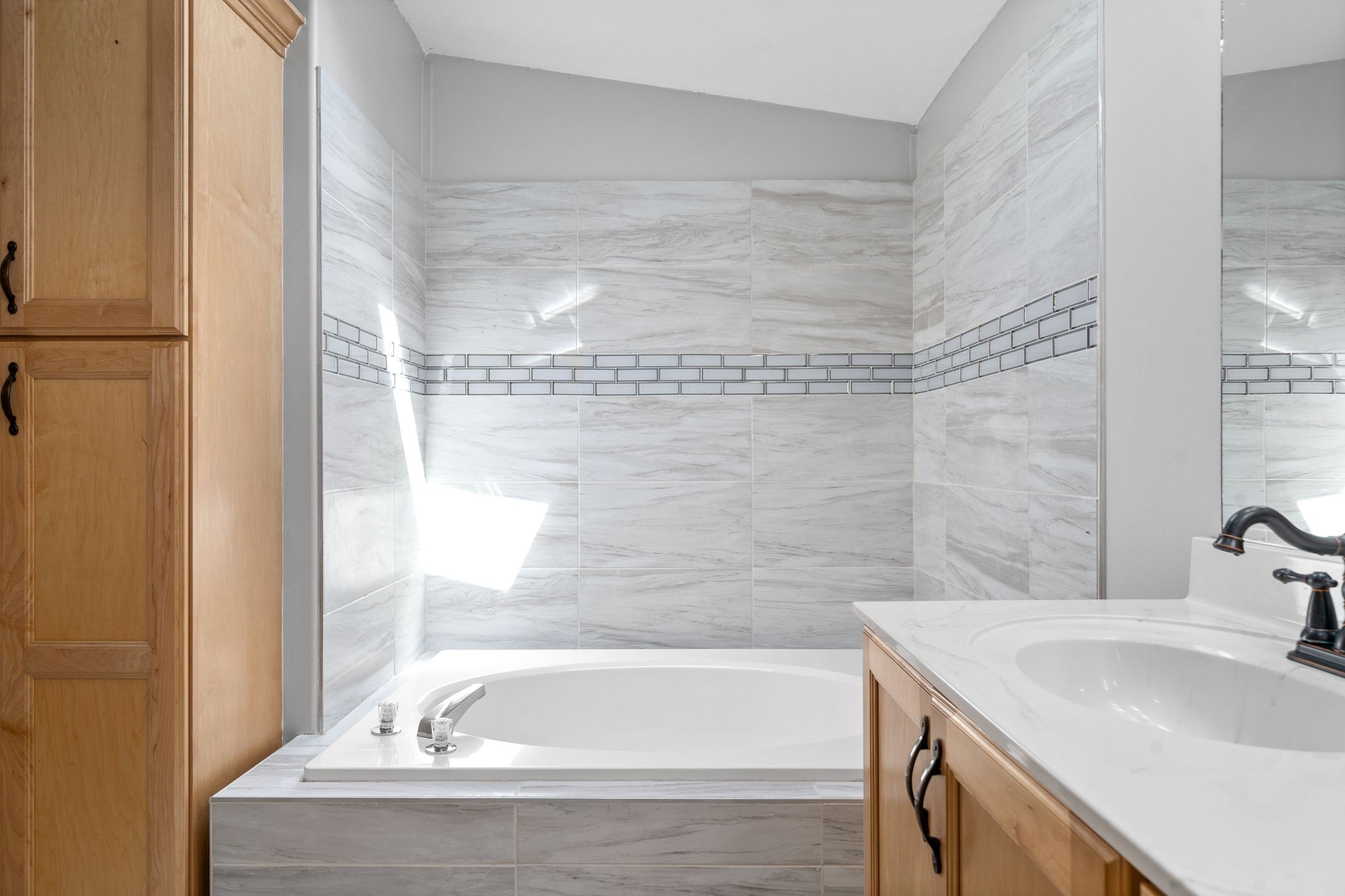 107 Holland Road Dickson, TN 37055 - Photo 18 of 31 a bathroom with a sink and a bathtub