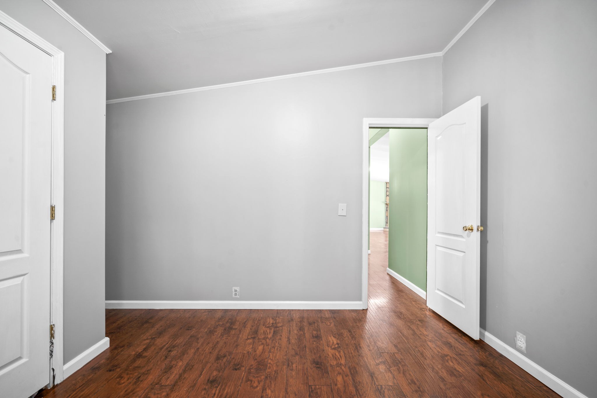107 Holland Road Dickson, TN 37055 - Photo 21 of 31 an empty room with wooden floor