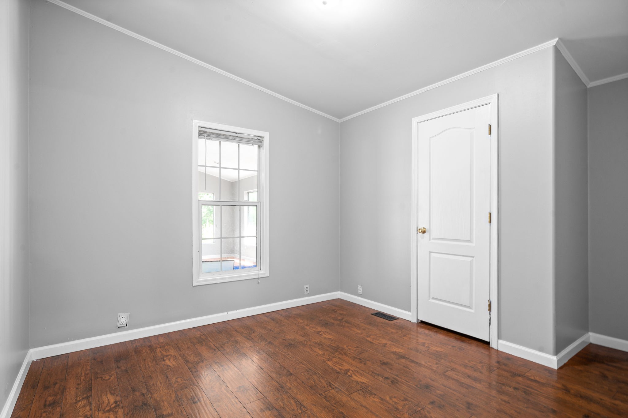 107 Holland Road Dickson, TN 37055 - Photo 22 of 31 an empty room with wooden floor and windows