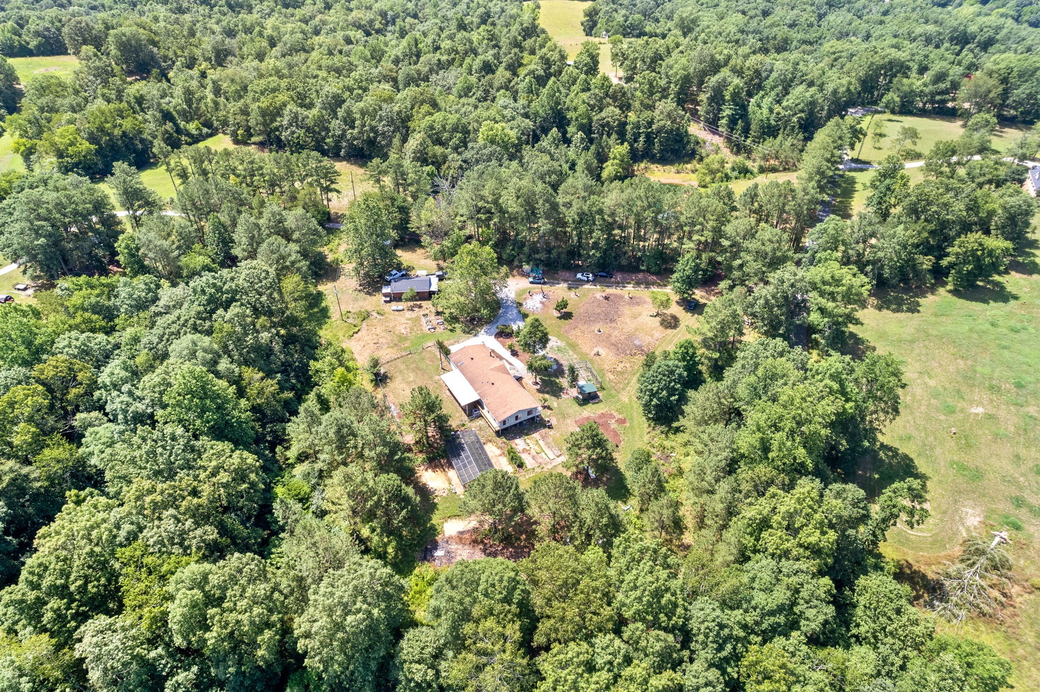 107 Holland Road Dickson, TN 37055 - Photo 31 of 31 an aerial view of residential house with outdoor space and trees all around
