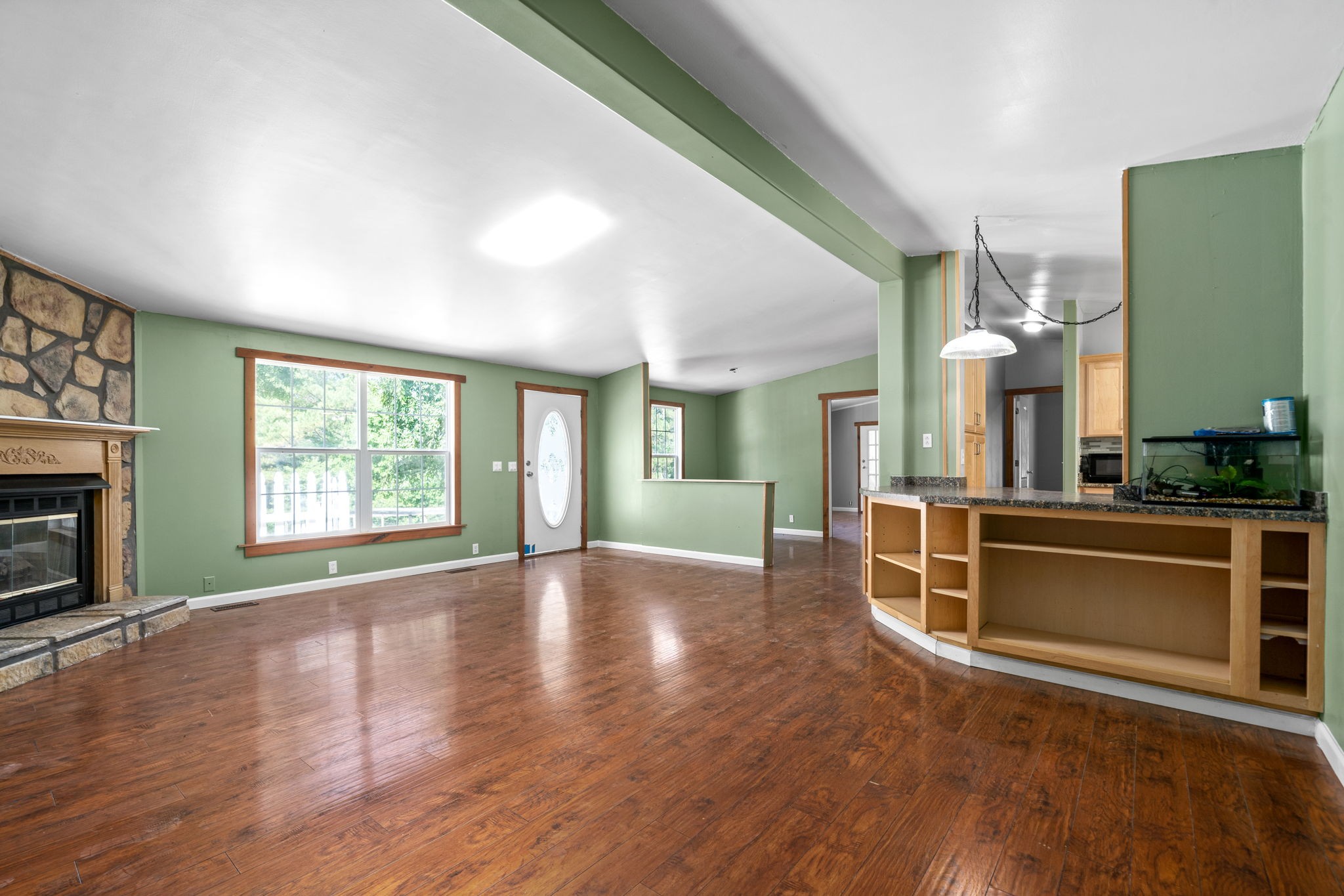 107 Holland Road Dickson, TN 37055 - Photo 6 of 31 a view of an empty room with window and fire place
