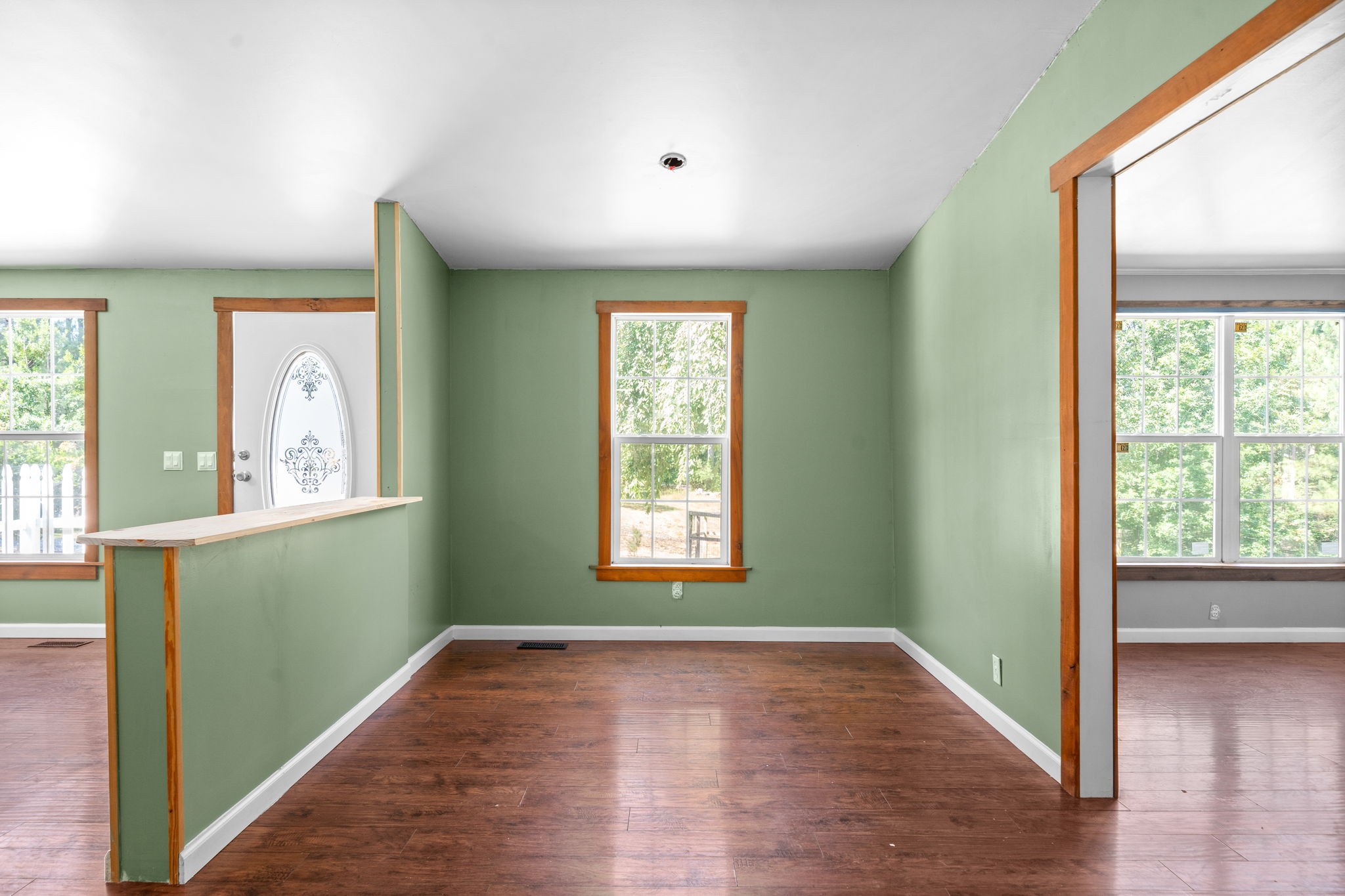 107 Holland Road Dickson, TN 37055 - Photo 7 of 31 a view of empty room with wooden floor and fan