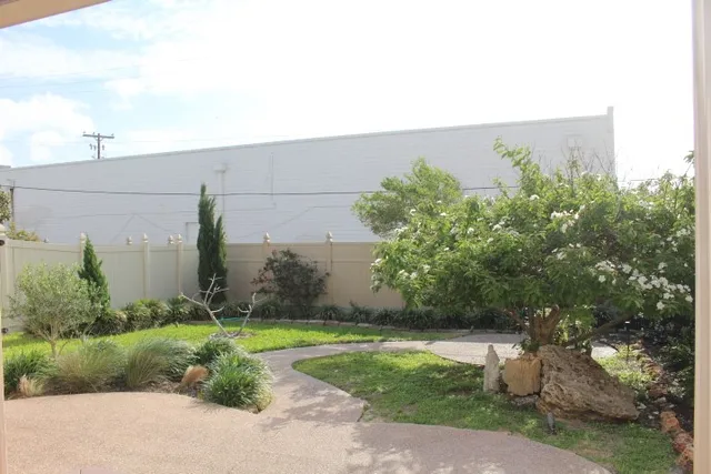 a view of outdoor space and yard