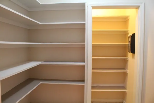 a storage room with washer and dryer