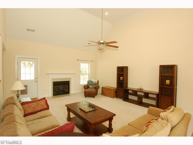 2693 Weymoth Road Winston-Salem, NC 27103 - Photo 2 of 12 Living Room. Living room has access to deck, fireplace, vaulted ceiling - freshly painted.
