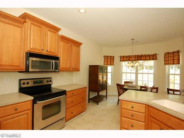 2693 Weymoth Road Winston-Salem, NC 27103 - Photo 5 of 12 Kitchen. Another view of kitchen, breakfast overlooks backyard.