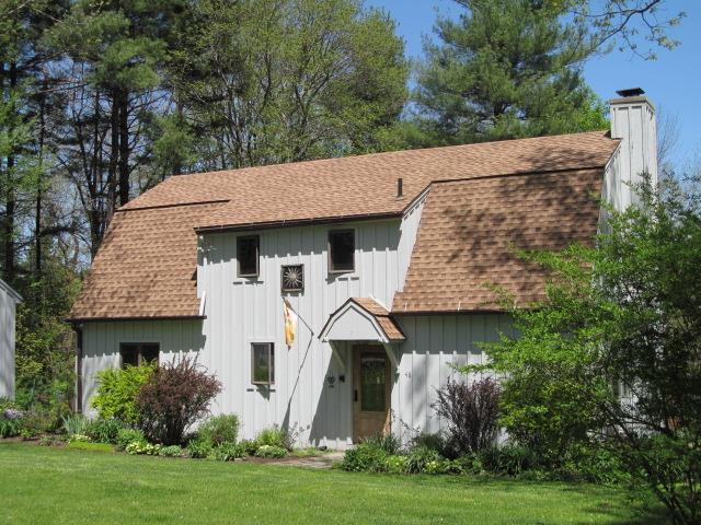48 Goodhouse Road Litchfield, CT 06759 - Photo 1 of 1 a front view of a house with garden
