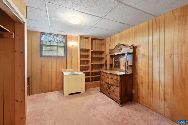 a room with furniture and a window