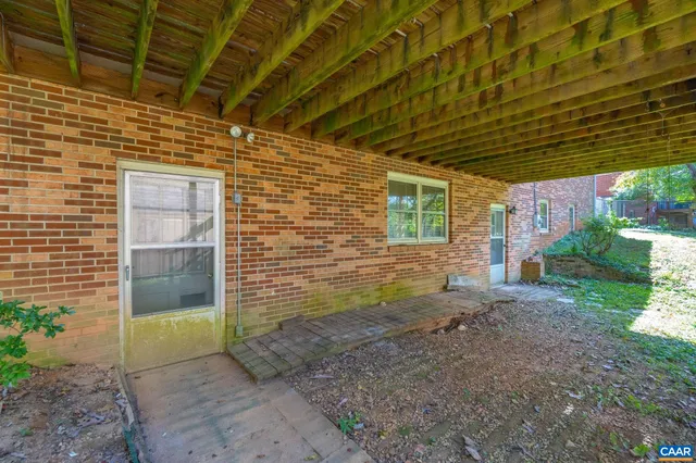 a view of a pathway with a yard