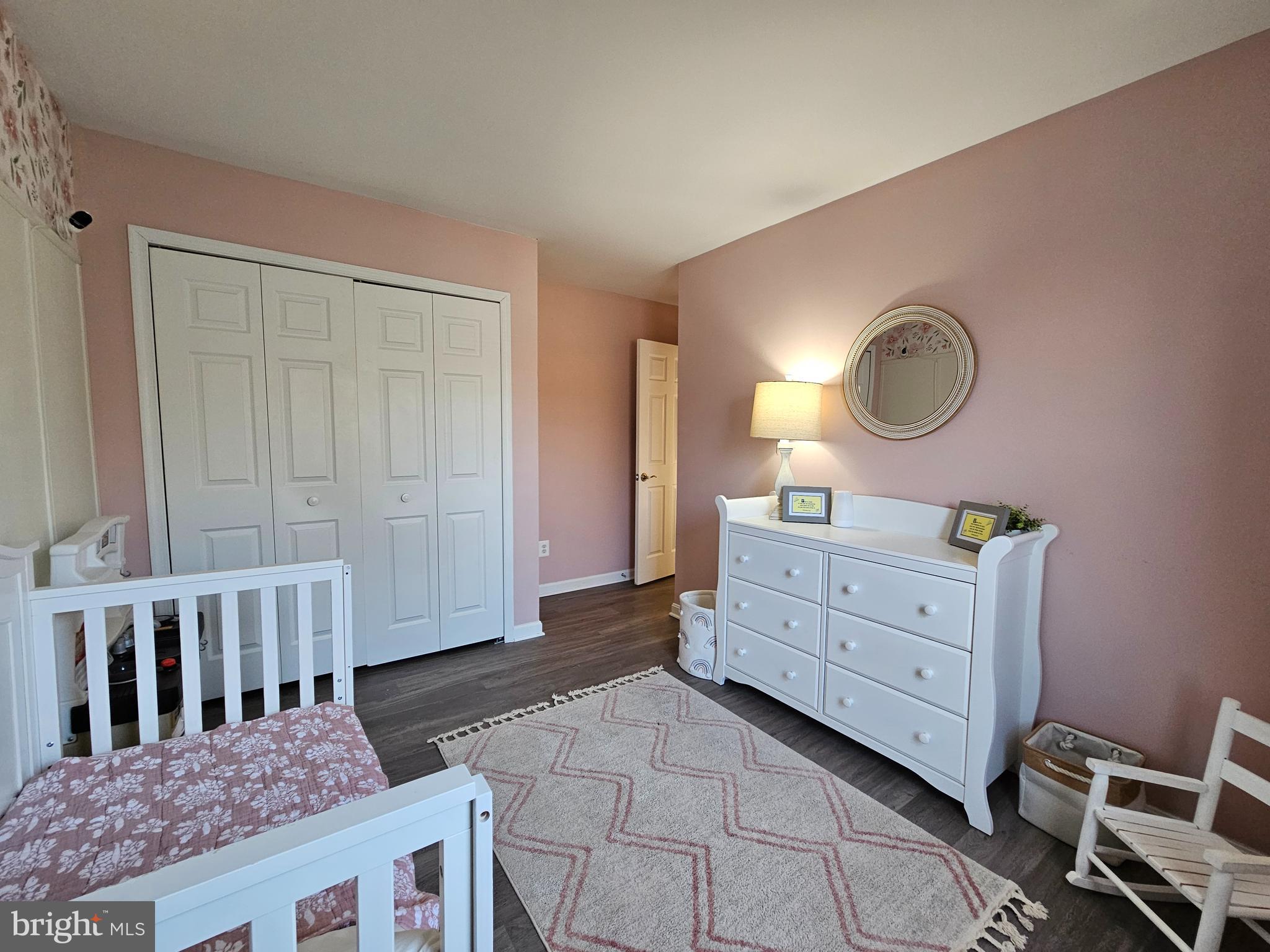 413 Cedar Grove Road Edgewater, MD 21037 - Photo 18 of 30 a bed room with a bed and a mirror