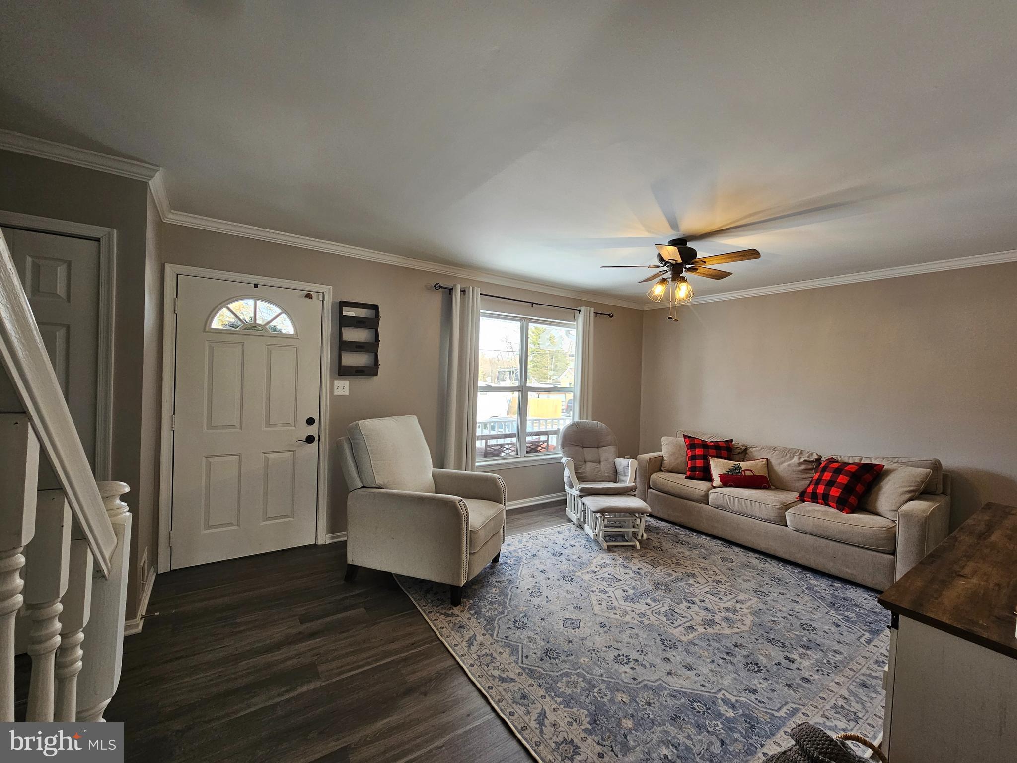 413 Cedar Grove Road Edgewater, MD 21037 - Photo 2 of 30 a living room with furniture and wooden floor