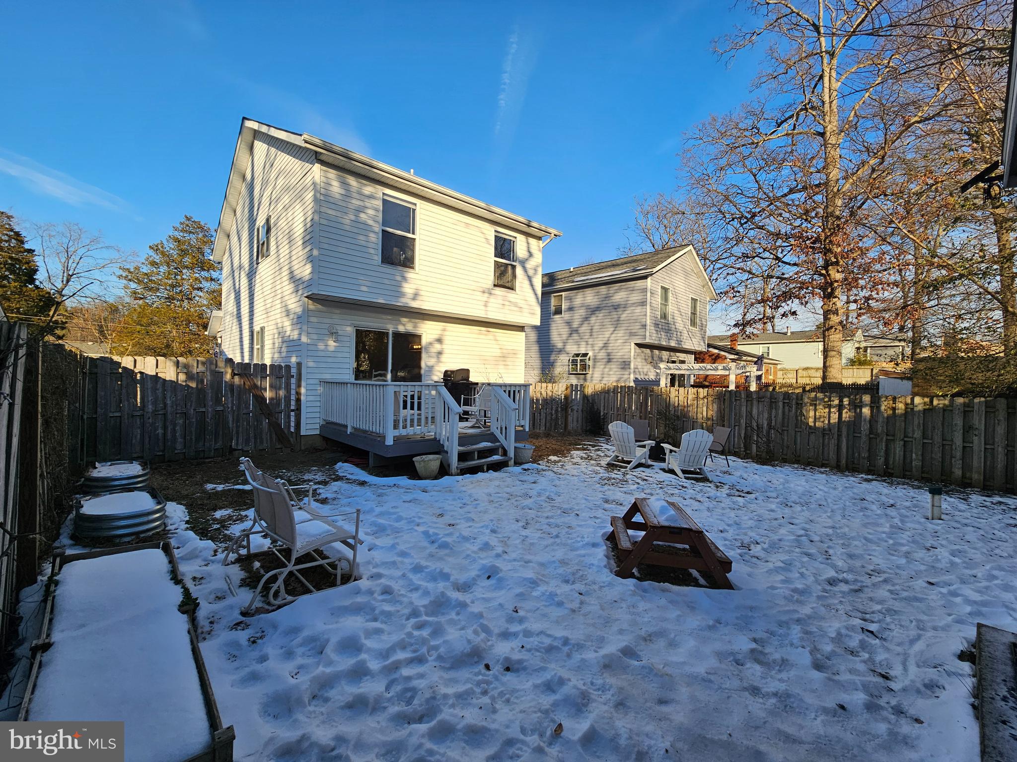 413 Cedar Grove Road Edgewater, MD 21037 - Photo 22 of 30 a view of a backyard with sitting area and tree