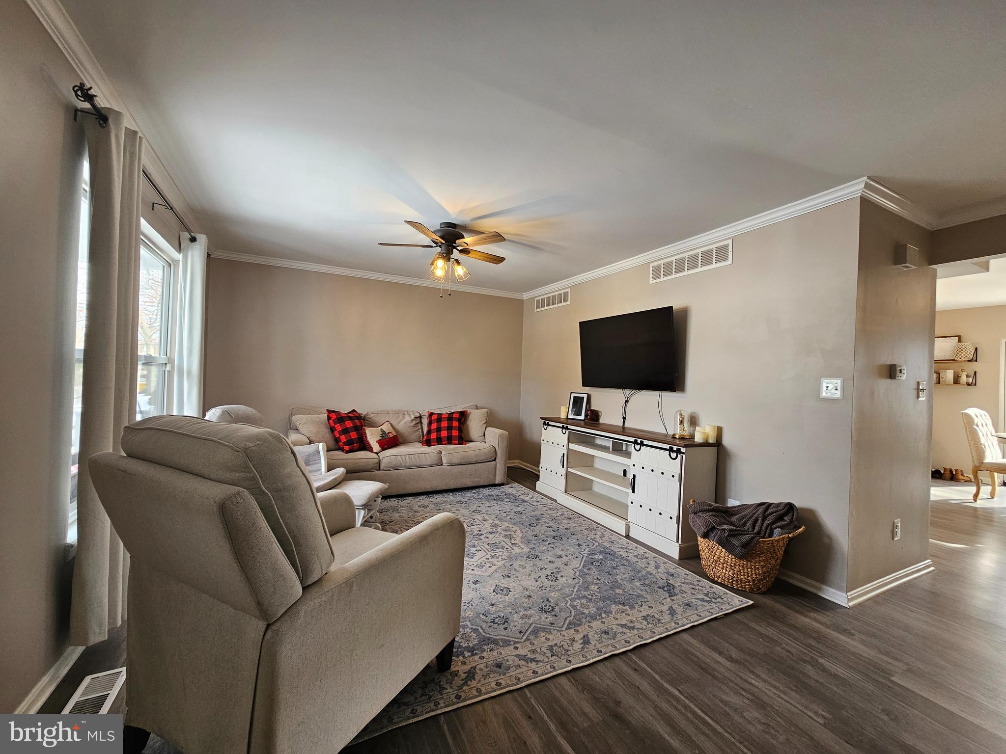 413 Cedar Grove Road Edgewater, MD 21037 - Photo 3 of 30 a living room with furniture and a flat screen tv