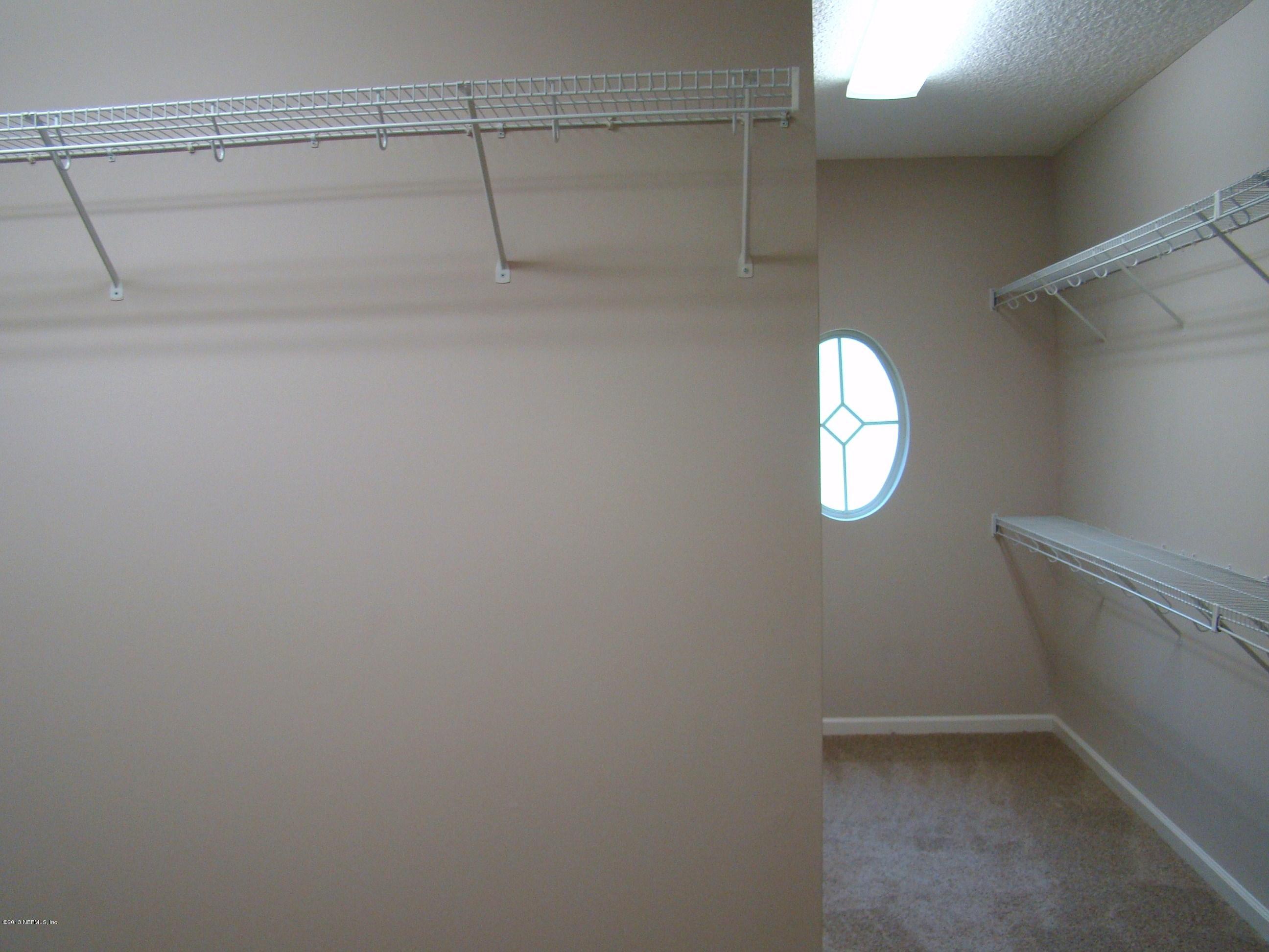 2870 Ravines Road Middleburg, FL 32068 - Photo 17 of 32 MASTER CLOSET VIEW 1