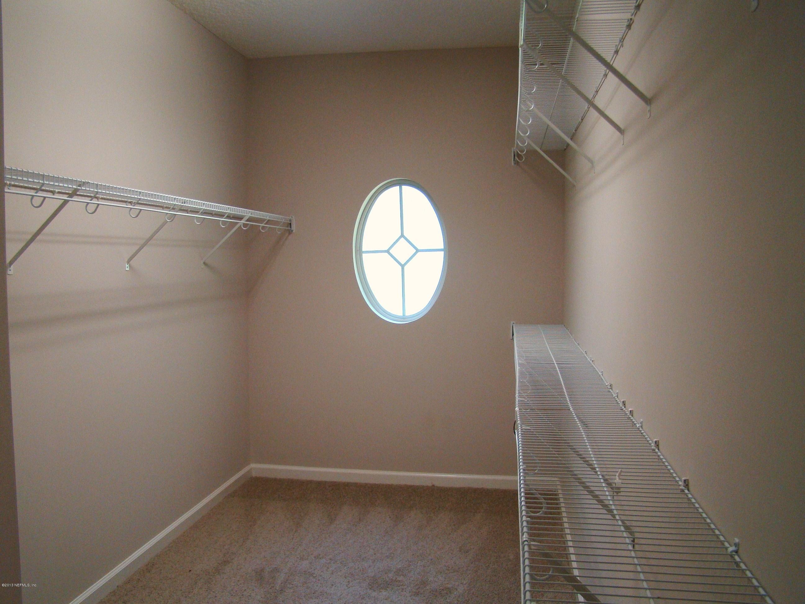 2870 Ravines Road Middleburg, FL 32068 - Photo 18 of 32 MASTER CLOSET VIEW 2