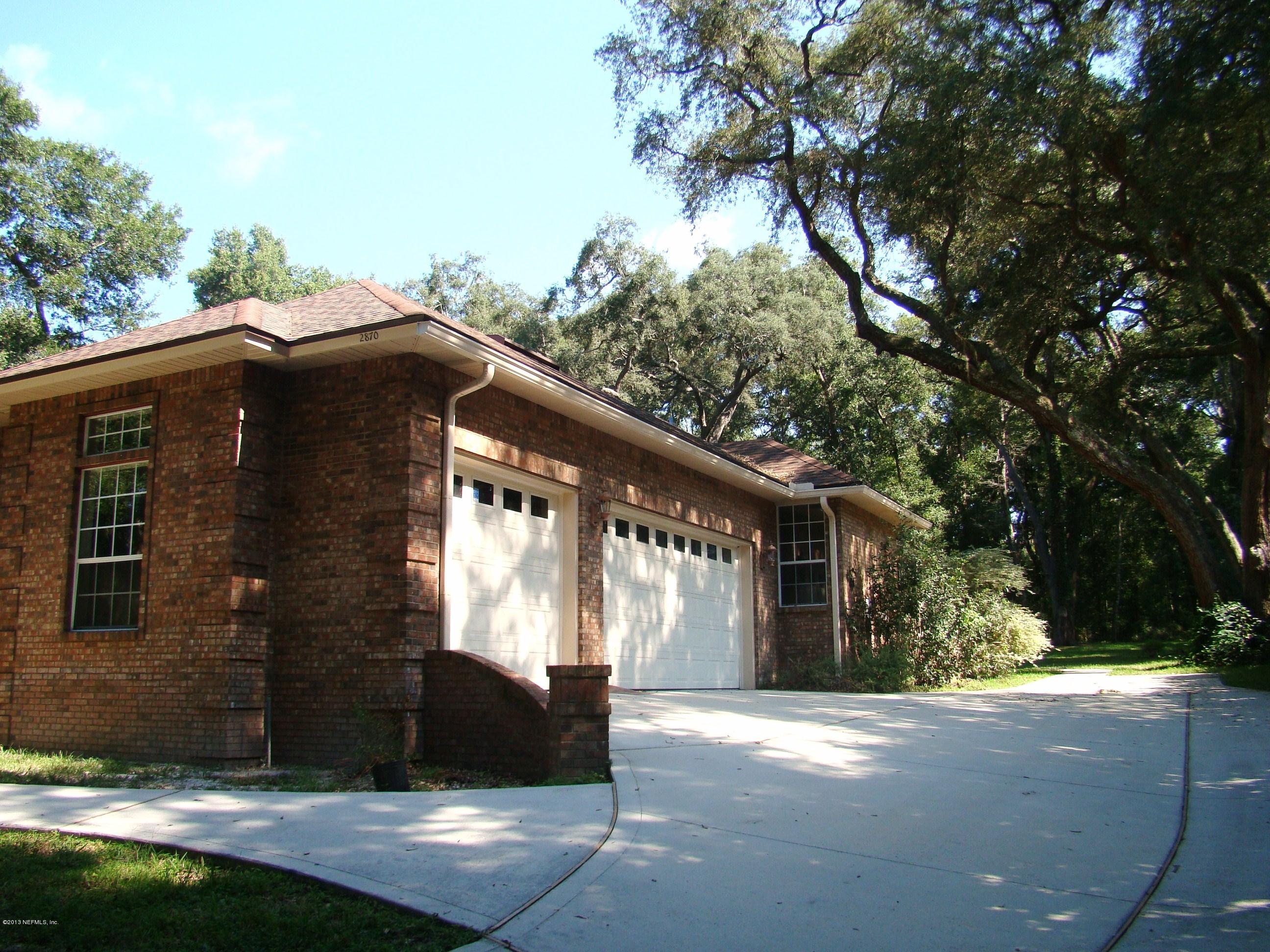 2870 Ravines Road Middleburg, FL 32068 - Photo 3 of 32 SIDE ENTRY GARAGE