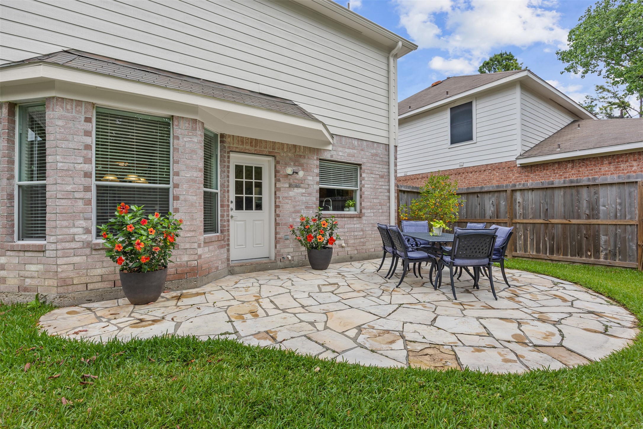 2219 Louetta Brook Lane Spring, TX 77388 - Photo 6 of 34 Stone patio perfect for outdoor dining and entertaining.
