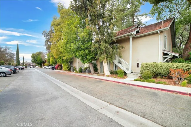 front view of a house with a street