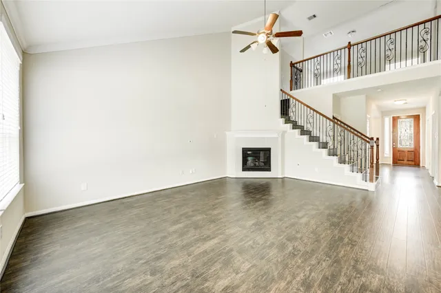 a view of an entryway with wooden floor