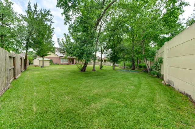 a view of a backyard with a garden
