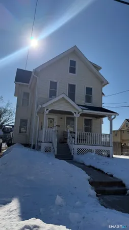 a house view with a garden space