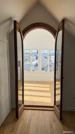 a view of an empty room with window