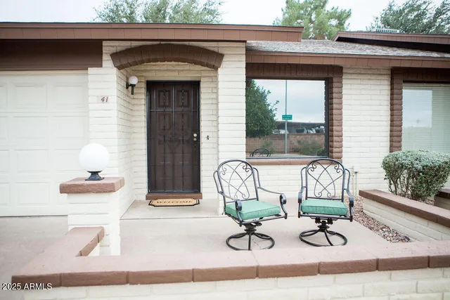 a view of house with outdoor seating space