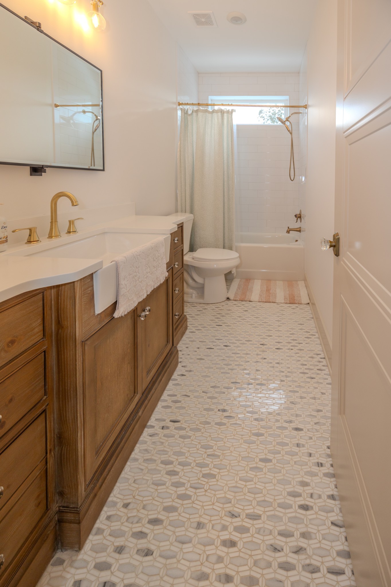 725 Oregon Road Lascassas, TN 37085 - Photo 54 of 76 a bathroom with a sink a toilet and shower