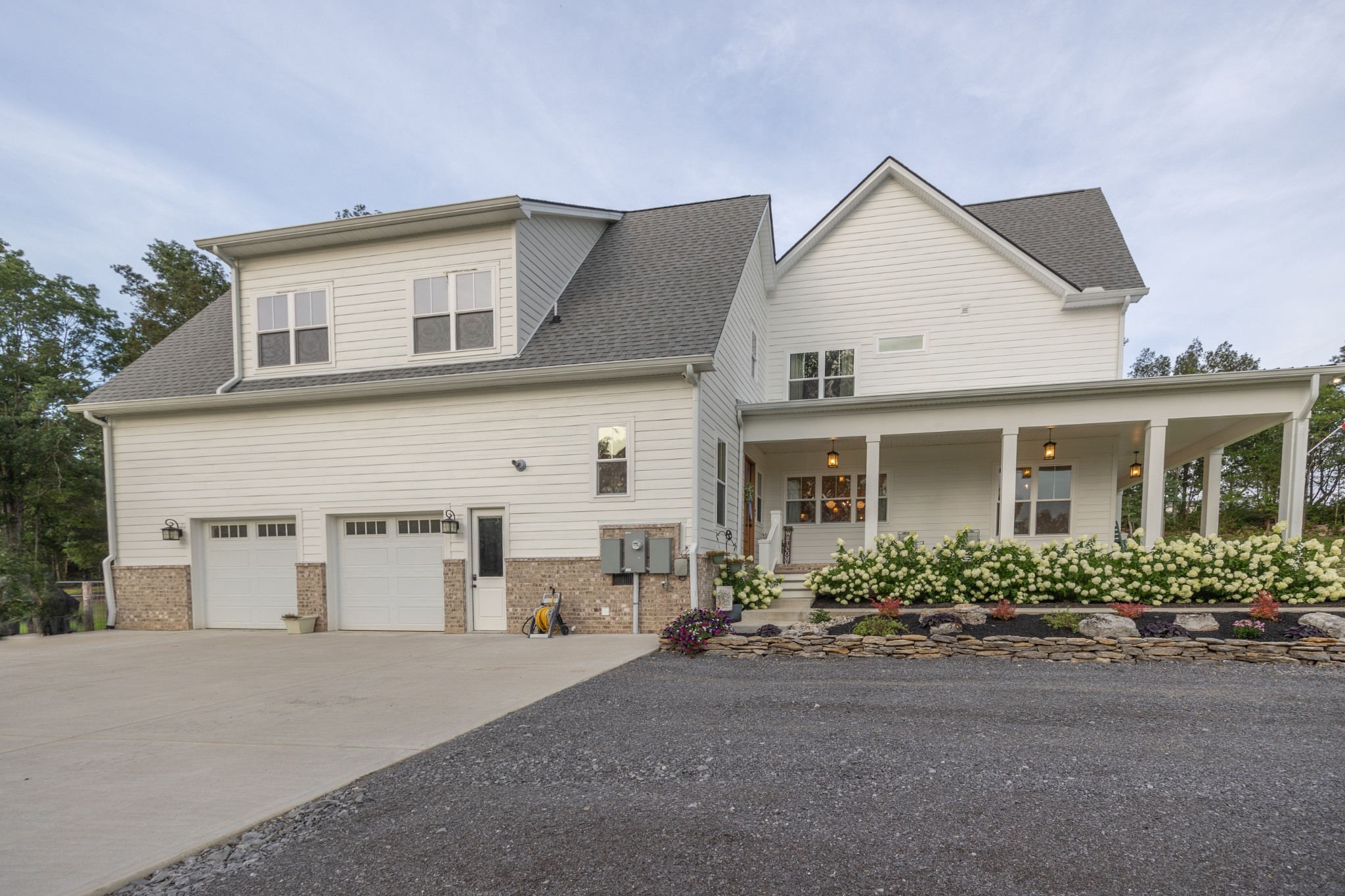 725 Oregon Road Lascassas, TN 37085 - Photo 6 of 76 front view of a house with a street