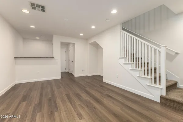 a bathroom with a double vanity sink mirror and shower