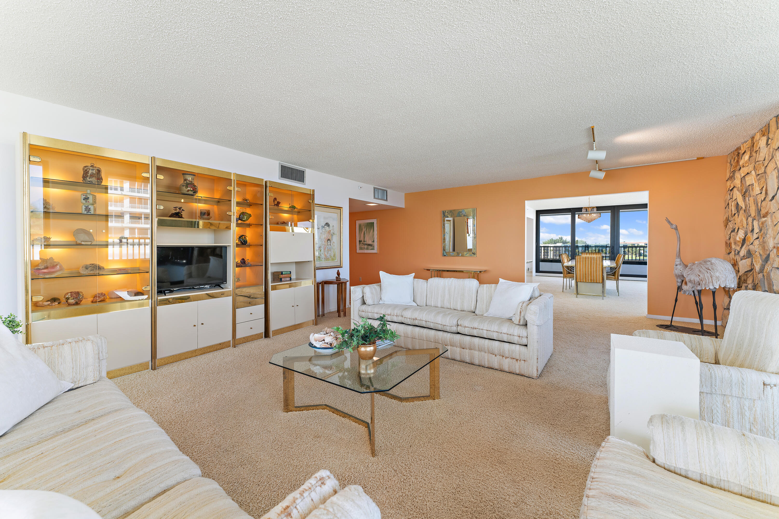19900 South Beach Road, Unit 601 Jupiter, FL 33469 - Photo 14 of 84 a living room with furniture large window and flat screen tv