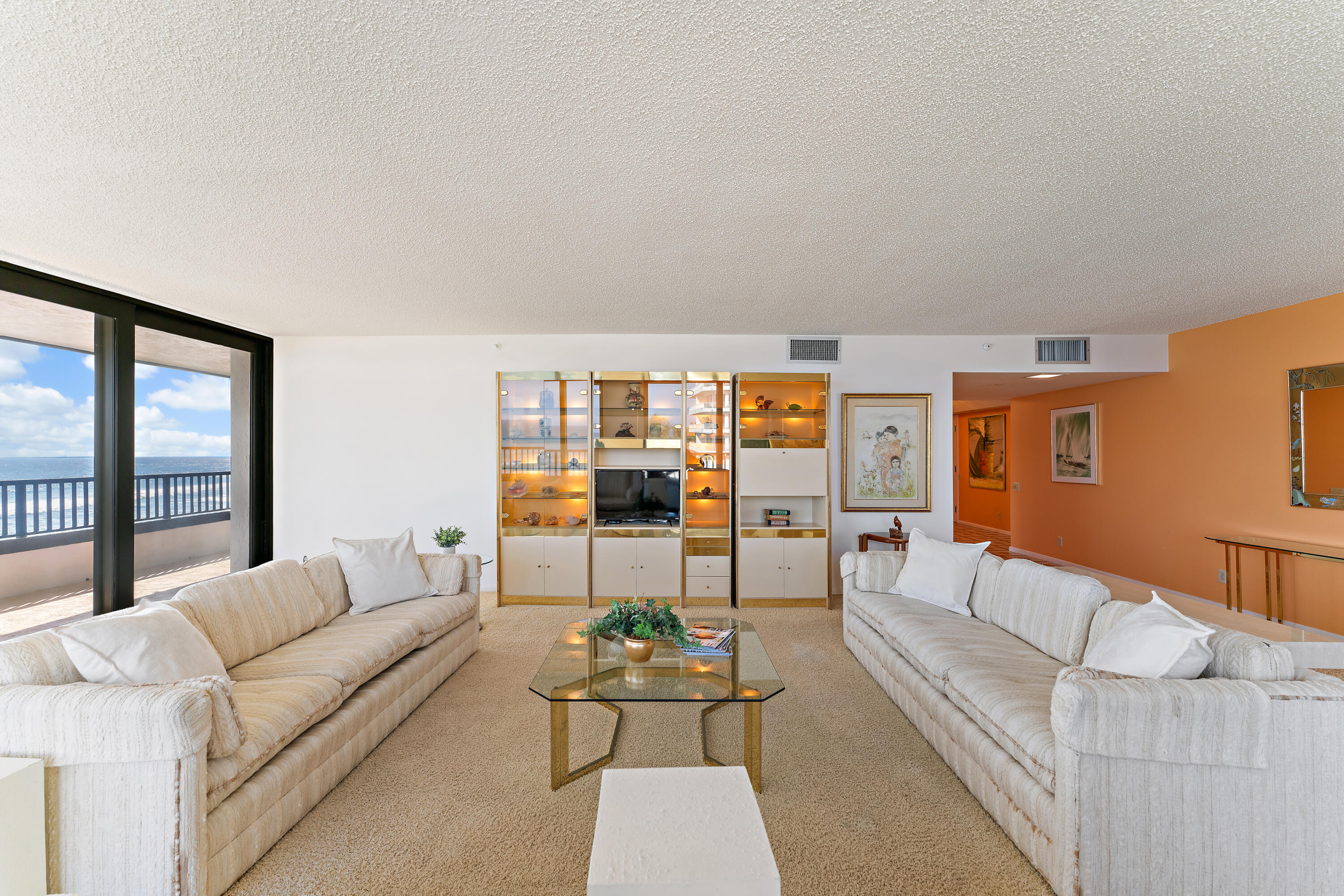 19900 South Beach Road, Unit 601 Jupiter, FL 33469 - Photo 16 of 84 a living room with furniture and a table
