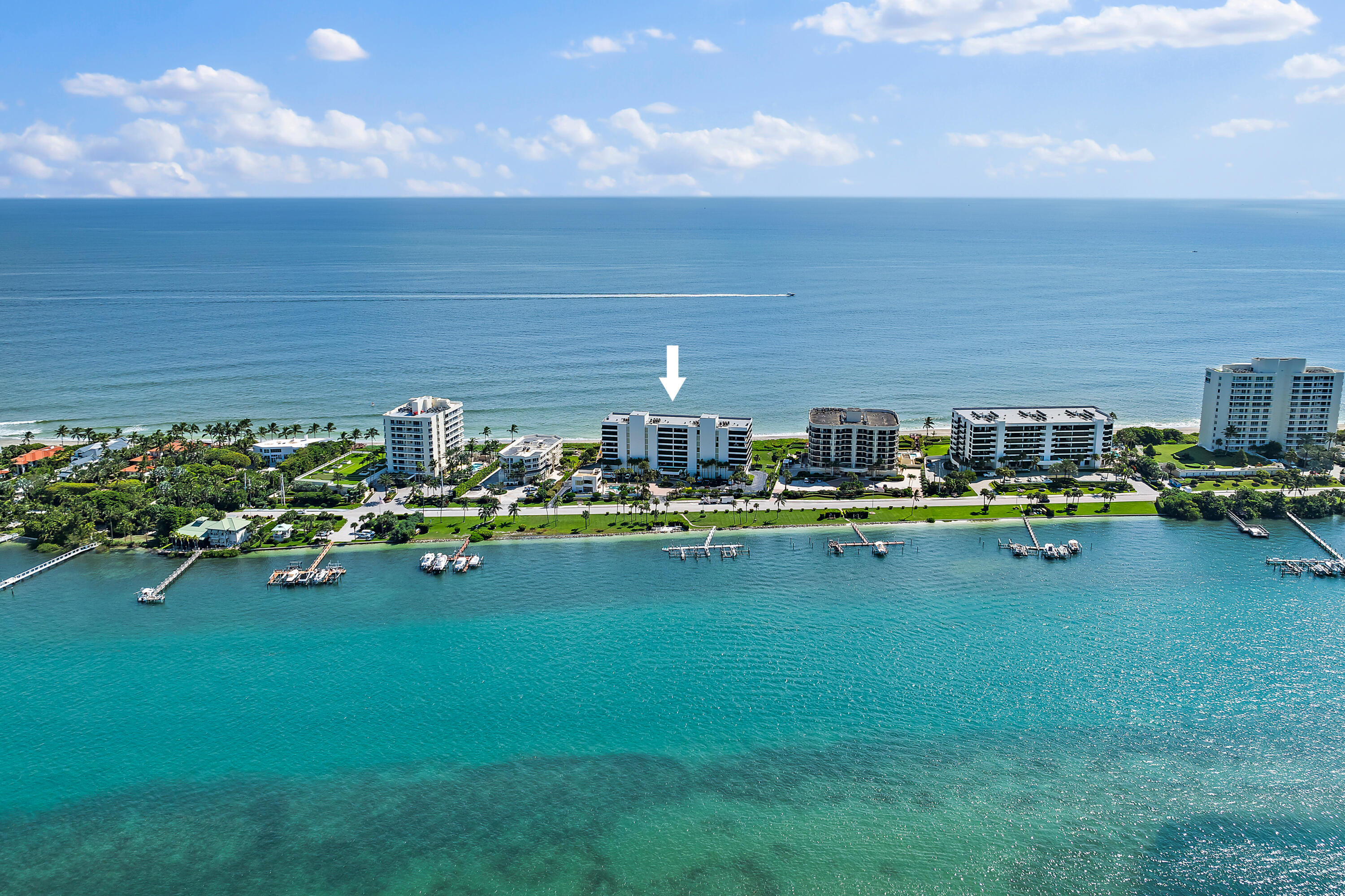 19900 South Beach Road, Unit 601 Jupiter, FL 33469 - Photo 3 of 84 a view of swimming pool with outdoor seating and yard in back
