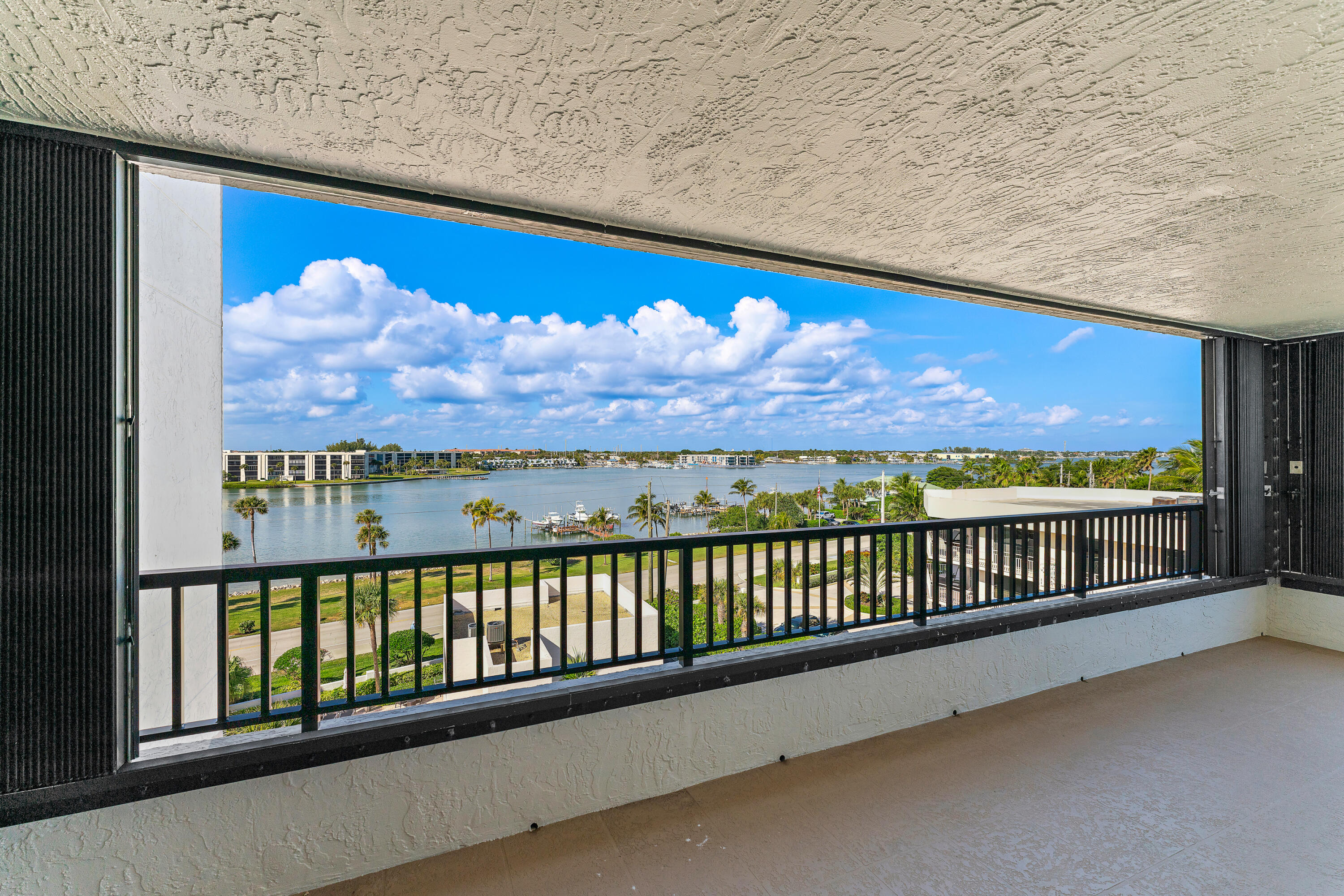 19900 South Beach Road, Unit 601 Jupiter, FL 33469 - Photo 37 of 84 a view of a street from a balcony
