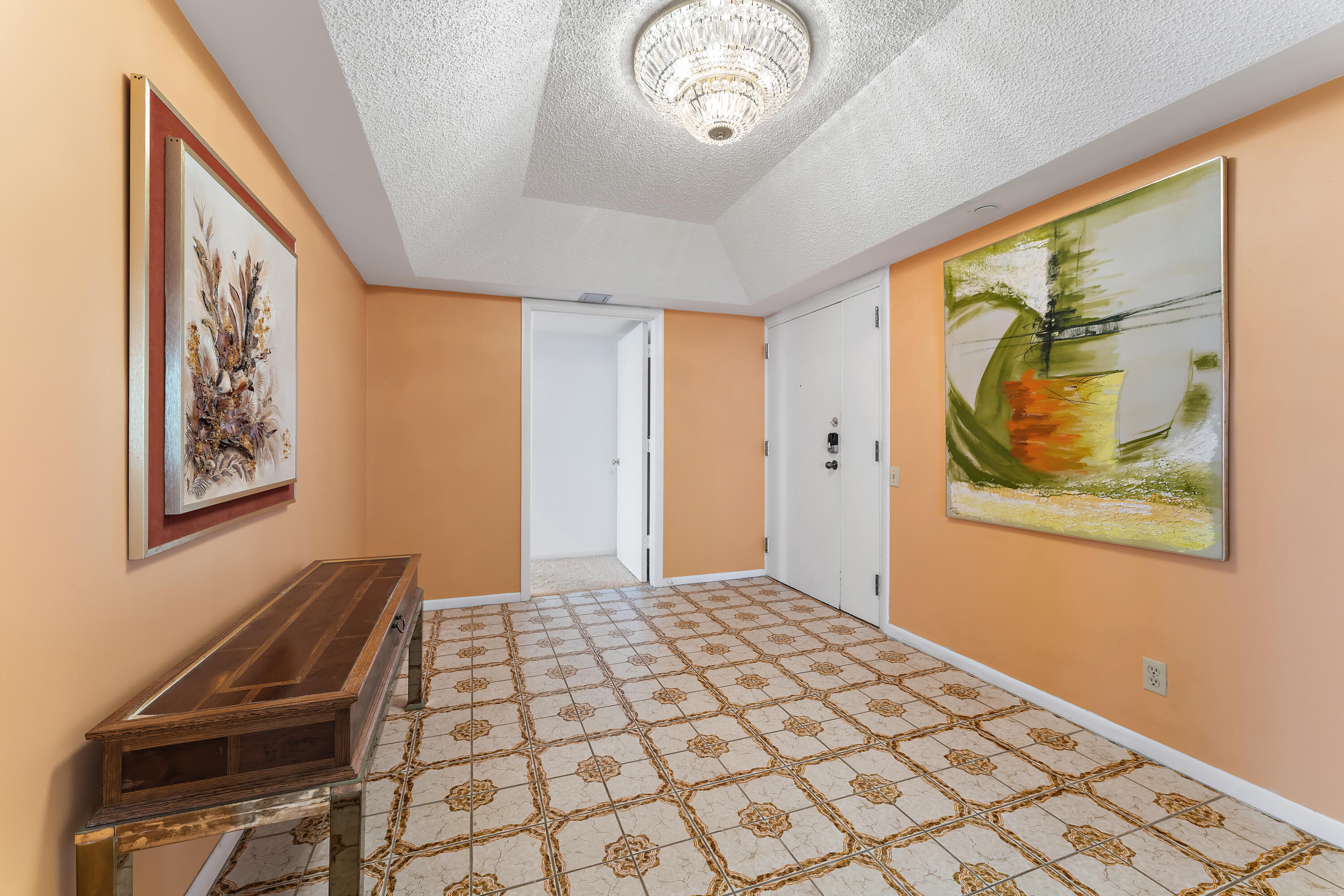 19900 South Beach Road, Unit 601 Jupiter, FL 33469 - Photo 40 of 84 a bedroom with a bed and a painting on the wall