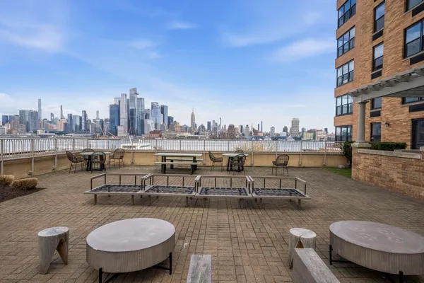 a view of a terrace with sitting area