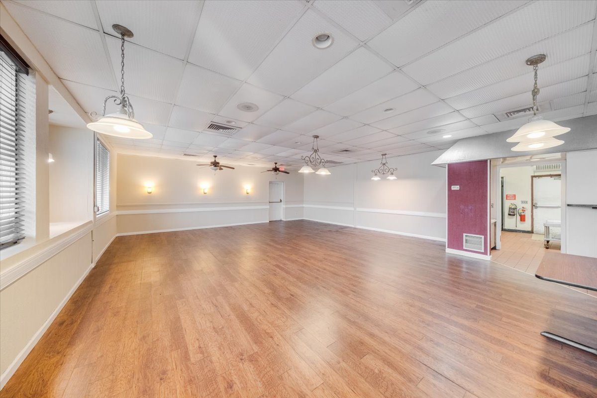 2312 West Springfield Avenue Champaign, IL 61821 - Photo 12 of 48 a view of a room with lots of wooden floor