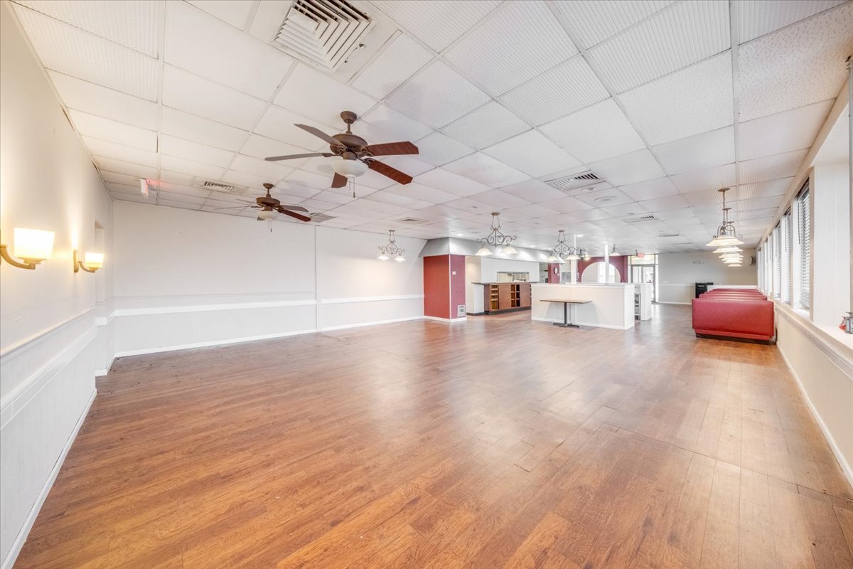2312 West Springfield Avenue Champaign, IL 61821 - Photo 14 of 48 a view of a room with wooden floor
