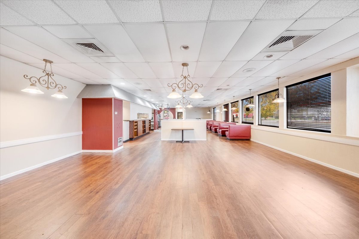 2312 West Springfield Avenue Champaign, IL 61821 - Photo 15 of 48 a living room with furniture and window
