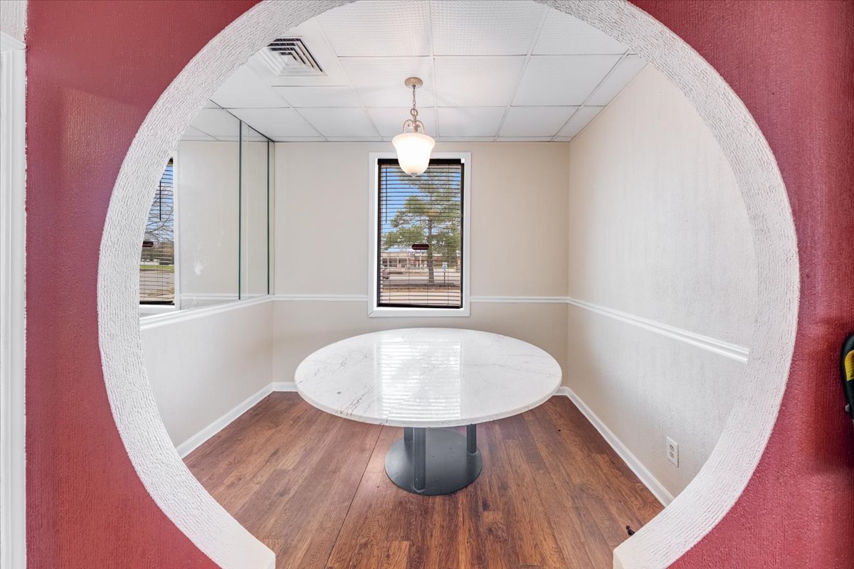 2312 West Springfield Avenue Champaign, IL 61821 - Photo 4 of 48 a view of dining room and wooden floor
