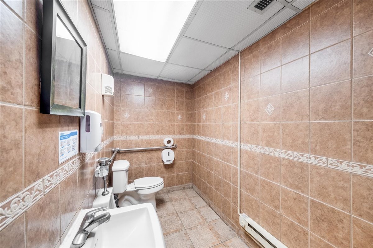 2312 West Springfield Avenue Champaign, IL 61821 - Photo 42 of 48 a bathroom with a toilet and a shower