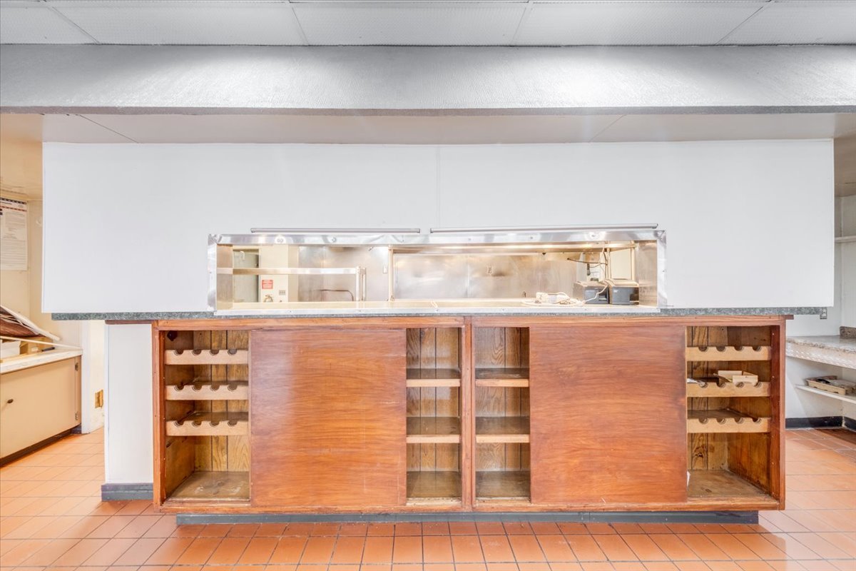 2312 West Springfield Avenue Champaign, IL 61821 - Photo 7 of 48 a black and white photo of a living room