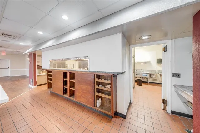 a view of a kitchen with kitchen