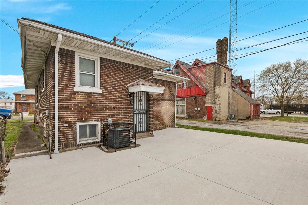 456 Bridge Street Gary, IN 46404 - Photo 3 of 27 a view of a house with a patio