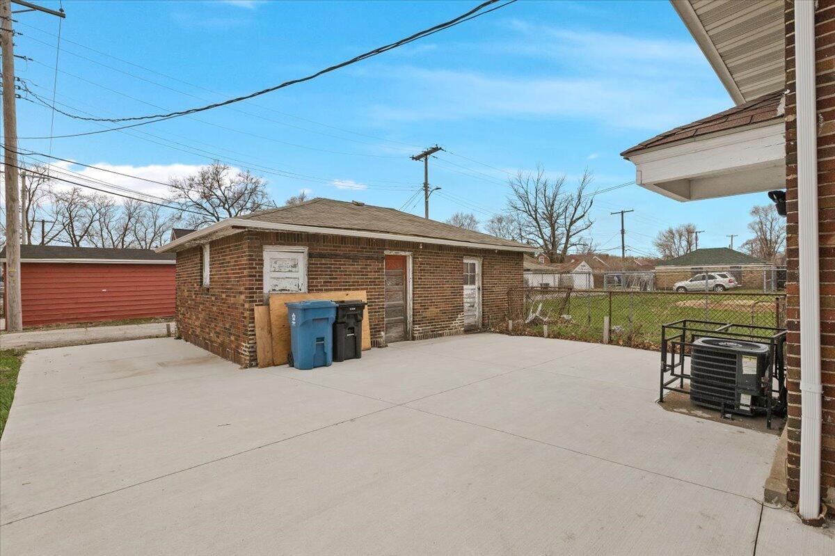 456 Bridge Street Gary, IN 46404 - Photo 5 of 27 a view of a house with a outdoor space