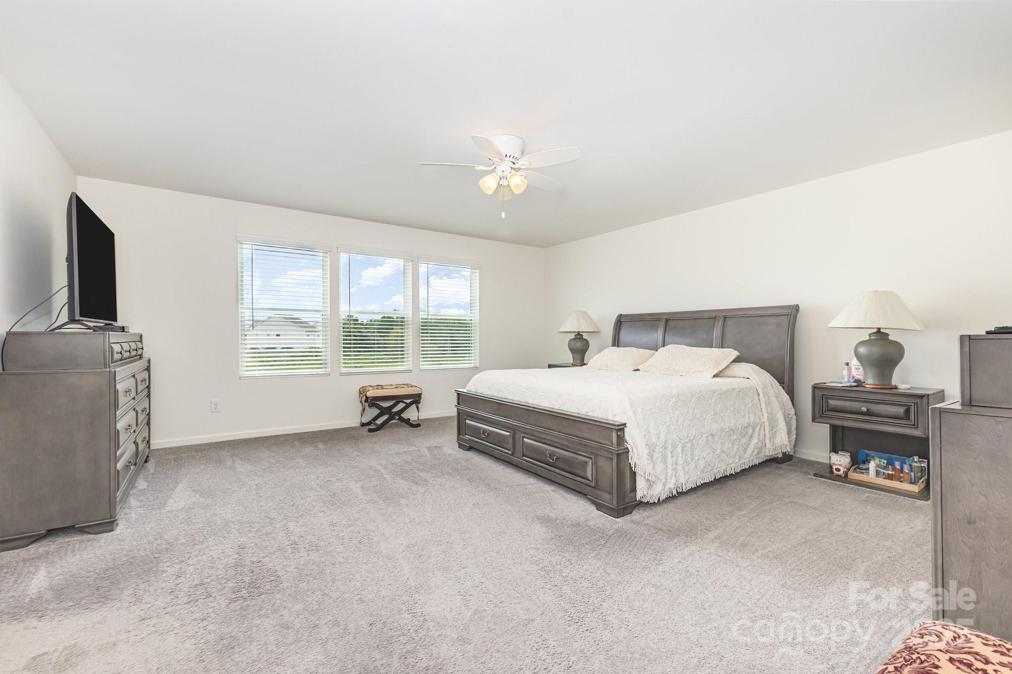 12926 Hill Pine Road Midland, NC 28107 - Photo 16 of 30 a bedroom with a bed and a window