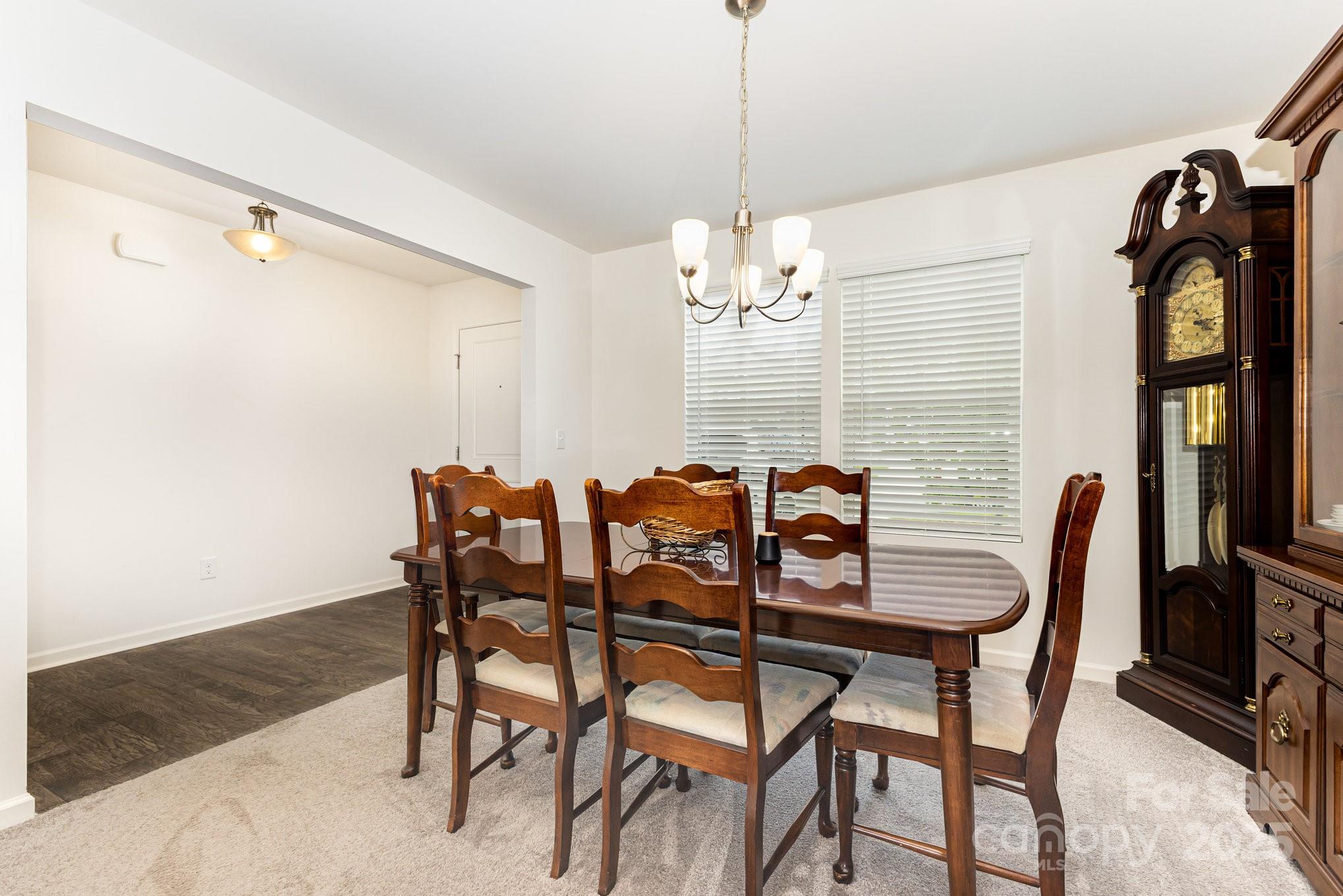 12926 Hill Pine Road Midland, NC 28107 - Photo 25 of 30 a view of a dining room with furniture window and wooden floor