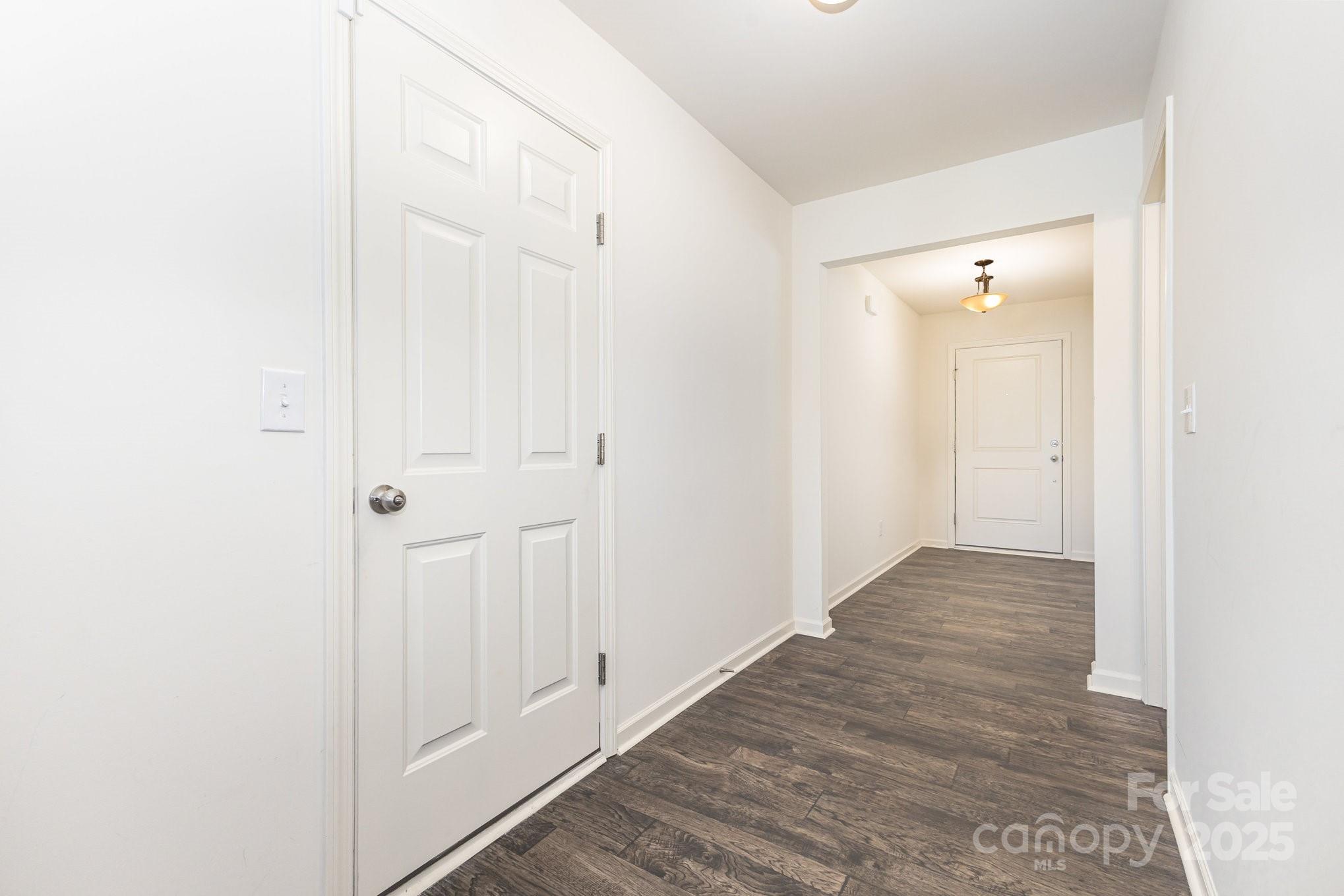 12926 Hill Pine Road Midland, NC 28107 - Photo 10 of 30 a view of a hallway with wooden floor