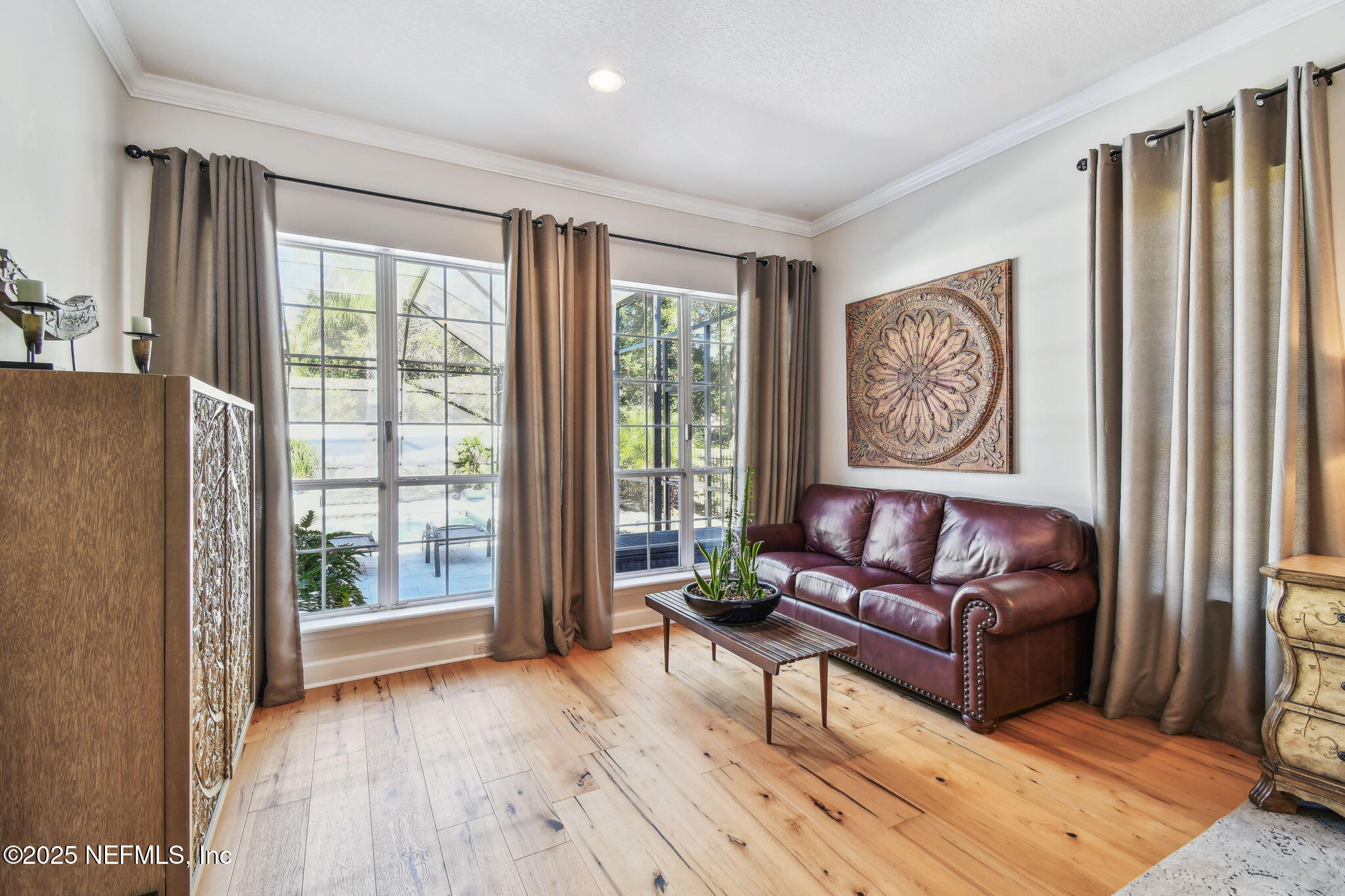 100 La Mesa Drive St. Augustine, FL 32095 - Photo 26 of 49 a living room with furniture and a window